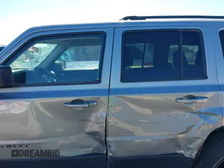2015 Jeep Patriot Sport with VIN 1C4NJPBA8FD325398, listed as a IAAI auction lot 40696837 with 136,130 mi miles. Bid and sale history available at carsss.com. Image 6.