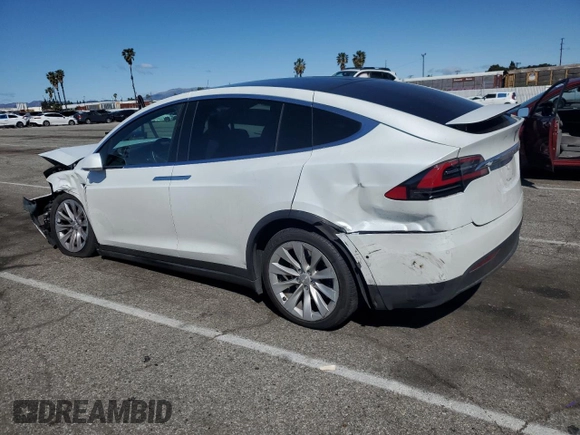 2020 Tesla Model X Long Range with VIN 5YJXCAE26LF270135, listed as a Copart auction lot 49711735 with Not Provided miles and Salvage Title. Bid and sale history available at carsss.com. Image 2.