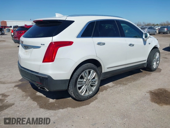 2017 Cadillac XT5 Premium Luxury FWD z VIN 1GYKNCRS9HZ106397, wystawiony jako IAAI lot #41659420 z przebiegiem 54 615 mil mil oraz . Historia ofert i sprzedaży dostępna na DreamBid. Obrazek 4.