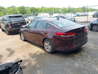 2018 Kia Optima LX with VIN 5XXGT4L36JG185545, listed as a IAAI auction lot 42434301 with 118,303 mi miles and . Bid and sale history available at DreamBid. Image 3.