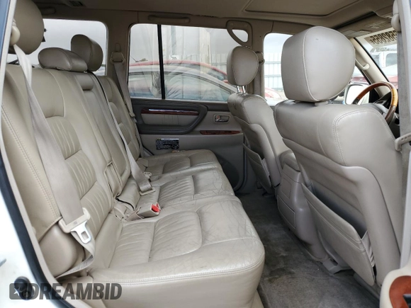2002 Lexus LX 470 z VIN JTJHT00W423522126, wystawiony jako Copart lot #56582855 z przebiegiem 280 679 mil mil oraz Szkoda całkowita • Salvage title. Historia ofert i sprzedaży dostępna na DreamBid. Obrazek 11.