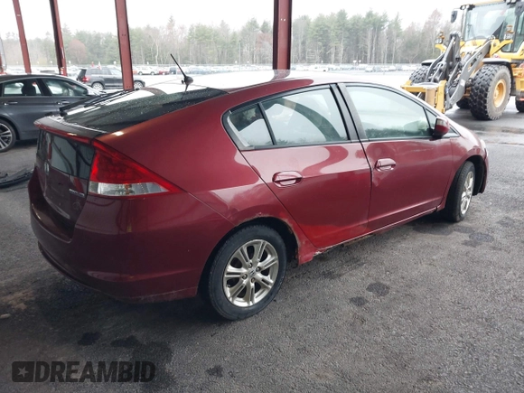 2010 Honda Insight EX with VIN JHMZE2H74AS033674, listed as a IAAI auction lot 41953858 with 144,018 mi miles and . Bid and sale history available at DreamBid. Image 4.