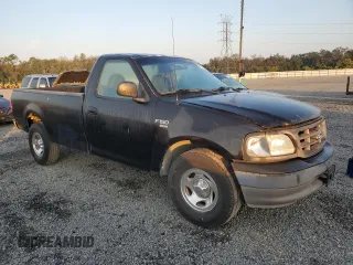 2003 Ford F-150 XL with VIN 1FTRF17W13NA97772, listed as a Copart auction lot 77692074 with Not Provided miles and Salvage Title. Bid and sale history available at DreamBid. Image 4.