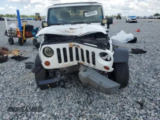 2012 Jeep Wrangler Unlimited Sport with VIN 1C4BJWDG6CL240673, listed as a Copart auction lot 60669625 with Not provided miles and Salvage title. Bid and sale history available at DreamBid. Image 5.