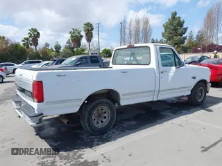 1995 Ford F-150 with VIN 2FTDF15N2SCA58486, listed as a IAAI auction lot 41931788 with 305,999 mi miles. Bid and sale history available at carsss.com. Image 4.