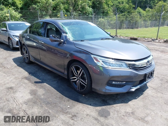 2016 Honda Accord Touring with VIN 1HGCR3F94GA009459, listed as a IAAI auction lot 42597128 with 182,977 mi miles and . Bid and sale history available at DreamBid. Image 1.