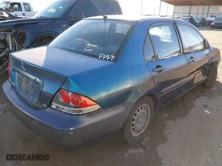 2005 Mitsubishi Lancer ES with VIN JA3AJ26E65U014838, listed as a IAAI auction lot 41310586 with 127,487 mi miles. Bid and sale history available at carsss.com. Image 4.