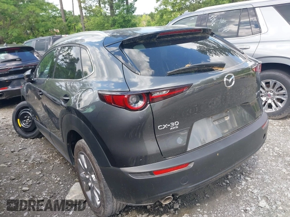 2023 Mazda CX-30 S Premium with VIN 3MVDMBDM2PM526974, listed as a IAAI auction lot 42155416 with 22,428 mi miles and . Bid and sale history available at carsss.com. Image 3.