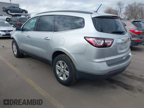 2013 Chevrolet Traverse LT with VIN 1GNKVGKD6DJ240146, listed as a IAAI auction lot 41665024 with 118,648 mi miles and . Bid and sale history available at DreamBid. Image 3.
