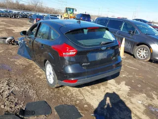 2015 Ford Focus SE with VIN 1FADP3K26FL289461, listed as a IAAI auction lot 41579565 with 148,738 mi miles. Bid and sale history available at carsss.com. Image 3.