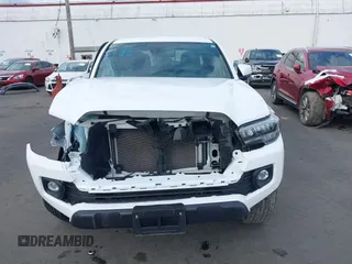 2023 Toyota Tacoma SR z VIN 3TMCZ5AN0PM541700, wystawiony jako IAAI lot #41819408 z przebiegiem 14 216 mil mil oraz . Historia ofert i sprzedaży dostępna na DreamBid. Obrazek 13.
