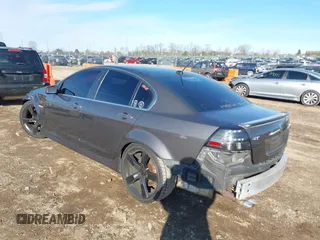 2009 Pontiac G8 GT with VIN 6G2EC57YX9L221534, listed as a IAAI auction lot 41227662 with 130,941 mi miles. Bid and sale history available at carsss.com. Image 3.
