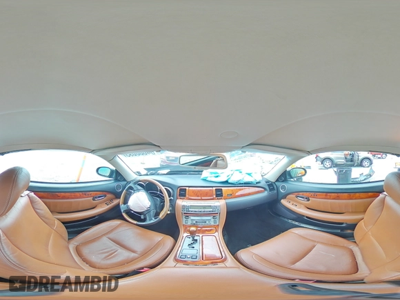 2002 Lexus SC 430 with VIN JTHFN48Y920006524, listed as a Copart auction lot 64680695 with 166,118 mi miles and Salvage title. Bid and sale history available at DreamBid. Image 15.