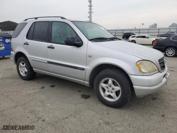 2001 Mercedes-Benz M-Class with VIN 4JGAB54E31A236148, listed as a Copart auction lot 41420905 with 163,120 mi miles and Clean Title. Bid and sale history available at carsss.com. Image 4.