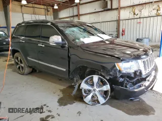 2013 Jeep Grand Cherokee Overland with VIN 1C4RJFCT5DC640710, listed as a Copart auction lot 41474875 with 223,668 mi miles and Clean Title. Bid and sale history available at carsss.com. Image 4.