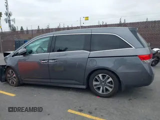 2014 Honda Odyssey Touring with VIN 5FNRL5H97EB114634, listed as a IAAI auction lot 42105220 with Not Provided miles and . Bid and sale history available at carsss.com. Image 13.