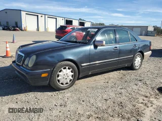 1998 Mercedes-Benz E-Class with VIN WDBJF25F3WA578364, listed as a Copart auction lot 77551834 with 228,913 mi miles and Salvage Title. Bid and sale history available at carsss.com. Image 1.