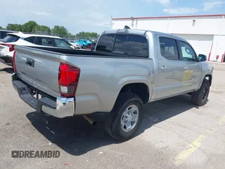 2023 Toyota Tacoma SR with VIN 3TYAX5GN0PT090132, listed as a IAAI auction lot 42472501 with 28,979 mi miles and . Bid and sale history available at DreamBid. Image 4.