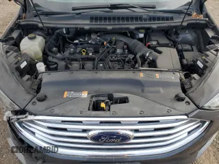 2019 Ford Edge SEL z VIN 2FMPK4J94KBB70789, wystawiony jako Copart lot #52565675 z przebiegiem 82 888 mil mil oraz Szkoda całkowita • Salvage title. Historia ofert i sprzedaży dostępna na DreamBid. Obrazek 12.