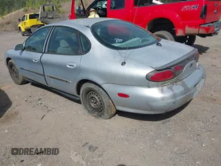 1999 Ford Taurus SE with VIN 1FAFP53U2XA322747, listed as a IAAI auction lot 41817160 with 230,319 mi miles. Bid and sale history available at carsss.com. Image 3.