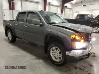 2010 GMC Canyon SLE1 with VIN 1GTJTCDE5A8148716, listed as a Copart auction lot 57559215 with 126,523 mi miles and Salvage title. Bid and sale history available at DreamBid. Image 4.