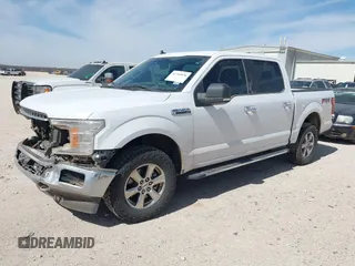 2019 Ford F-150 XL with VIN 1FTEW1E42KKE77610, listed as a IAAI auction lot 41765076 with 155,437 mi miles and . Bid and sale history available at DreamBid. Image 2.