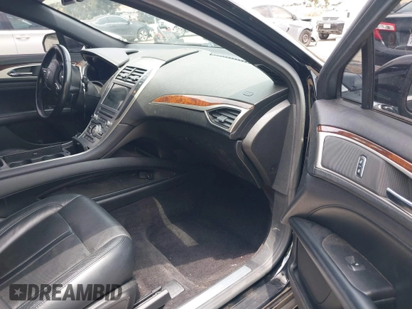 2017 Lincoln MKZ Reserve z VIN 3LN6L5EC2HR622768, wystawiony jako IAAI lot #42394044 z przebiegiem 78 914 mil mil oraz . Historia ofert i sprzedaży dostępna na DreamBid. Obrazek 5.