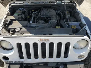 2014 Jeep Wrangler Unlimited Rubicon with VIN 1C4BJWFG0EL201559, listed as a Copart auction lot 59580575 with 182,101 mi miles and Salvage title. Bid and sale history available at DreamBid. Image 11.