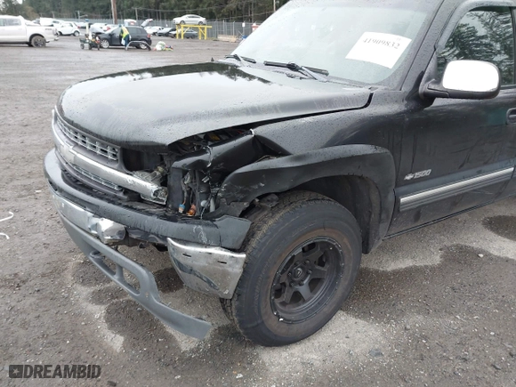 2000 Chevrolet Silverado 1500 LS with VIN 2GCEK19TXY1268976, listed as a IAAI auction lot 41909832 with 182,557 mi miles. Bid and sale history available at carsss.com. Image 6.