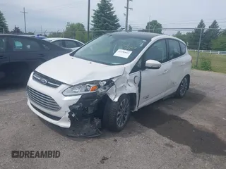 2017 Ford C-Max Titanium z VIN 1FADP5FU1HL100046, wystawiony jako IAAI lot #42356813 z przebiegiem 57 737 mil mil oraz . Historia ofert i sprzedaży dostępna na DreamBid. Obrazek 2.