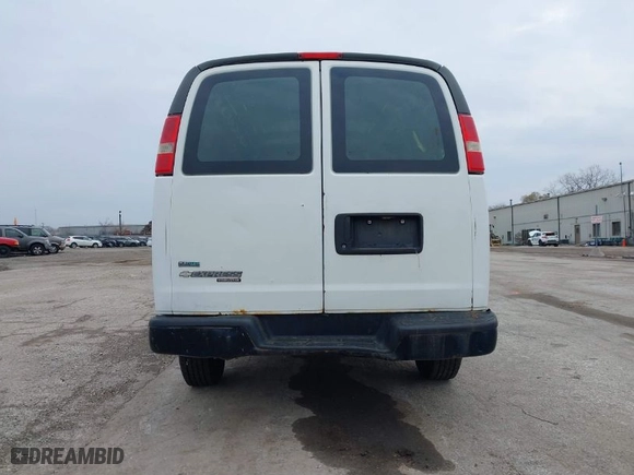 2011 Chevrolet Express Cargo Van with VIN 1GCWGFFA7B1108976, listed as a IAAI auction lot 40937070 with 296,821 mi miles. Bid and sale history available at carsss.com. Image 16.