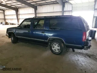 1999 Chevrolet Suburban with VIN 3GNEC16R5XG218523, listed as a Copart auction lot 72568494 with 297,020 mi miles and Salvage Title. Bid and sale history available at carsss.com. Image 2.