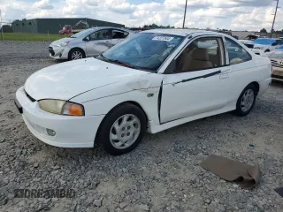 1997 Mitsubishi Mirage LS z VIN JA3AY31C1VU009019, wystawiony jako Copart lot #74227544 z przebiegiem 243 967 mil mil oraz Szkoda całkowita • Salvage title. Historia ofert i sprzedaży dostępna na DreamBid. Obrazek 1.