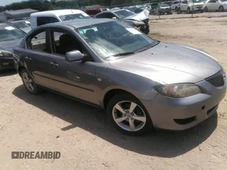 2006 Mazda 3 i Touring with VIN JM1BK32F061470828, listed as a IAAI auction lot 42211180 with 165,652 mi miles and . Bid and sale history available at DreamBid. Image 1.