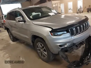 2017 Jeep Grand Cherokee Limited z VIN 1C4RJEBG3HC888023, wystawiony jako IAAI lot #42103815 z przebiegiem 214 763 mil mil oraz . Historia ofert i sprzedaży dostępna na DreamBid. Obrazek 1.
