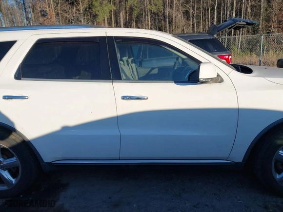 2012 Dodge Durango Crew with VIN 1C4SDJDT1CC163492, listed as a IAAI auction lot 41327149 with 253,076 mi miles. Bid and sale history available at carsss.com. Image 13.
