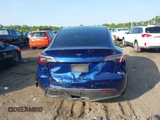2023 Tesla Model Y Long Range with VIN 7SAYGDEE0PF671726, listed as a IAAI auction lot 42393616 with Not provided miles and . Bid and sale history available at DreamBid. Image 16.