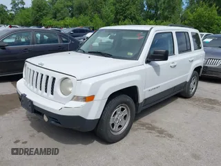 2014 Jeep Patriot Altitude with VIN 1C4NJPBA8ED504989, listed as a IAAI auction lot 42284403 with 196,922 mi miles and . Bid and sale history available at DreamBid. Image 2.