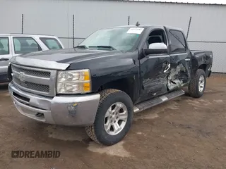 2013 Chevrolet Silverado 1500 LS with VIN 3GCPKREA2DG301949, listed as a IAAI auction lot 41532183 with 200,627 mi miles and . Bid and sale history available at DreamBid. Image 2.