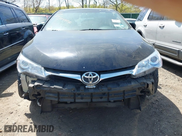 2015 Toyota Camry LE z VIN 4T1BD1FK7FU159767, wystawiony jako IAAI lot #42175153 z przebiegiem Nie podano mil oraz . Historia ofert i sprzedaży dostępna na DreamBid. Obrazek 6.