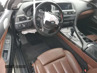 2012 BMW 6 Series 650i z VIN WBALX3C50CC528560, wystawiony jako Copart lot #81046454 z przebiegiem Nie podano mil oraz Nie do naprawy • Non repairable. Historia ofert i sprzedaży dostępna na DreamBid. Obrazek 8.
