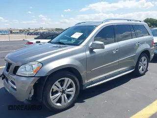 2012 Mercedes-Benz GL 450 z VIN 4JGBF7BE1CA800793, wystawiony jako IAAI lot #42312472 z przebiegiem 155 847 mil mil oraz . Historia ofert i sprzedaży dostępna na DreamBid. Obrazek 18.