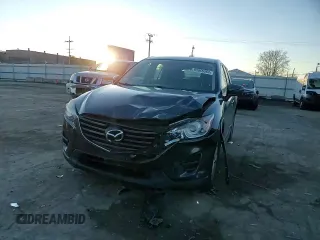 2016 Mazda CX-5 Sport with VIN JM3KE2BY9G0771969, listed as a Copart auction lot 80966064 with 99,348 mi miles and Salvage title. Bid and sale history available at DreamBid. Image 11.