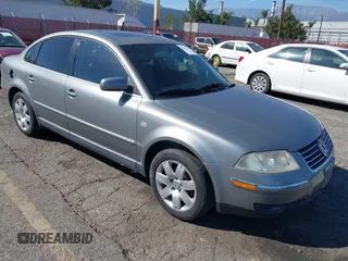 2003 Volkswagen Passat GLX z VIN WVWRH63B73P189189, wystawiony jako IAAI lot #41695418 z przebiegiem 135 023 mil mil oraz . Historia ofert i sprzedaży dostępna na DreamBid. Obrazek 1.