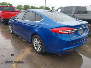 2017 Ford Fusion SE z VIN 3FA6P0H79HR170835, wystawiony jako IAAI lot #41911416 z przebiegiem 67 219 mil mil oraz . Historia ofert i sprzedaży dostępna na DreamBid. Obrazek 3.