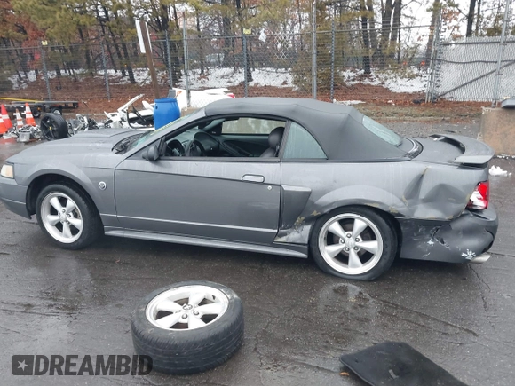 2004 Ford Mustang GT Deluxe z VIN 1FAFP45X74F128442, wystawiony jako IAAI lot #41580930 z przebiegiem 100 801 mil mil oraz . Historia ofert i sprzedaży dostępna na DreamBid. Obrazek 15.