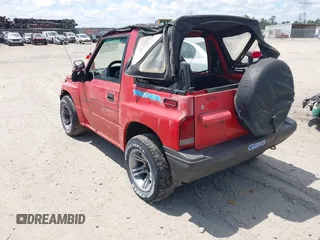 1995 Geo Tracker z VIN 2CNBE18U4S6935826, wystawiony jako IAAI lot #42072913 z przebiegiem 183 092 mil mil oraz . Historia ofert i sprzedaży dostępna na DreamBid. Obrazek 3.