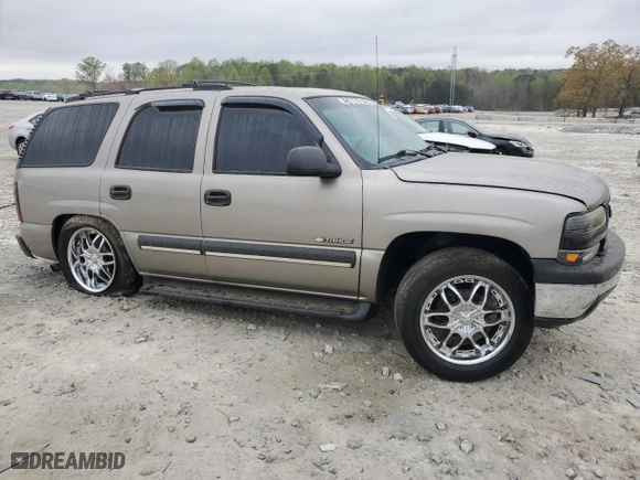 2003 Chevrolet Tahoe LS with VIN 1GNEC13V83J102923, listed as a Copart auction lot 51055625 with 250,631 mi miles and Salvage Title. Bid and sale history available at carsss.com. Image 4.