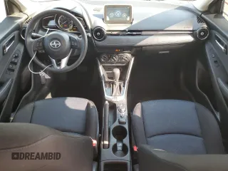 2016 Scion iA with VIN 3MYDLBZV5GY129159, listed as a Copart auction lot 50718245 with 144,058 mi miles and Salvage Title. Bid and sale history available at carsss.com. Image 8.