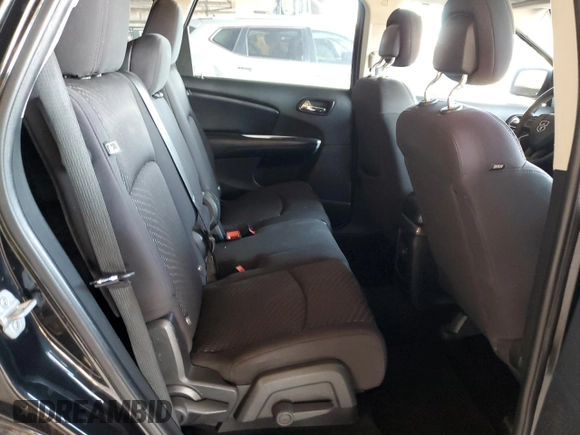 2013 Dodge Journey SE with VIN 3C4PDCAB4DT575943, listed as a Copart auction lot 48760385 with 127,081 mi miles and Salvage Title. Bid and sale history available at carsss.com. Image 11.